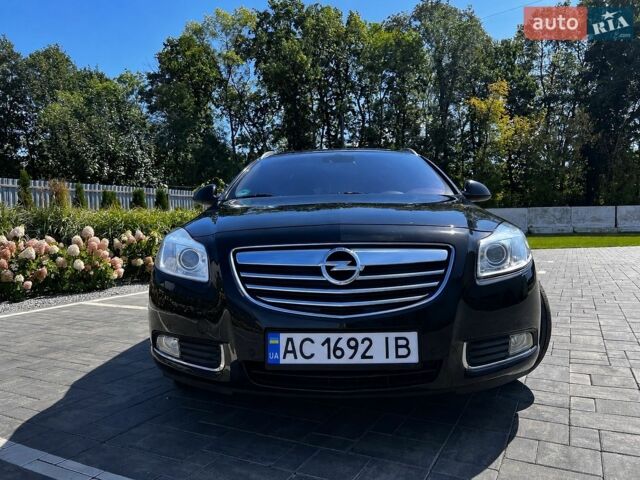Черный Опель Инсигния, объемом двигателя 2 л и пробегом 232 тыс. км за 8900 $, фото 1 на Automoto.ua