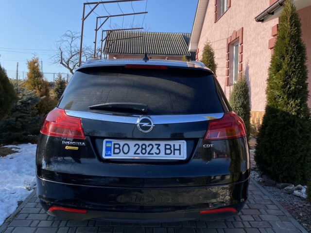 Чорний Опель Інсігнія, об'ємом двигуна 2 л та пробігом 208 тис. км за 10500 $, фото 1 на Automoto.ua