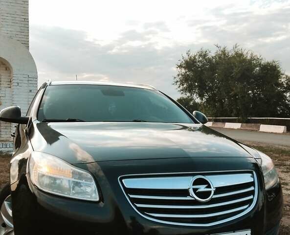 Черный Опель Инсигния, объемом двигателя 1.96 л и пробегом 293 тыс. км за 8100 $, фото 1 на Automoto.ua