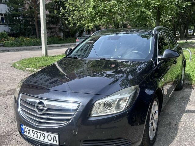 Чорний Опель Інсігнія, об'ємом двигуна 2 л та пробігом 243 тис. км за 7513 $, фото 1 на Automoto.ua