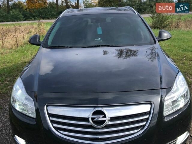 Черный Опель Инсигния, объемом двигателя 1.96 л и пробегом 320 тыс. км за 8000 $, фото 1 на Automoto.ua