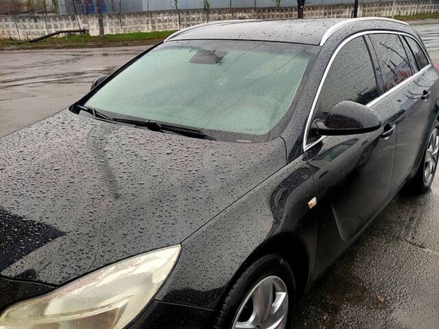 Чорний Опель Інсігнія, об'ємом двигуна 2 л та пробігом 250 тис. км за 7999 $, фото 1 на Automoto.ua