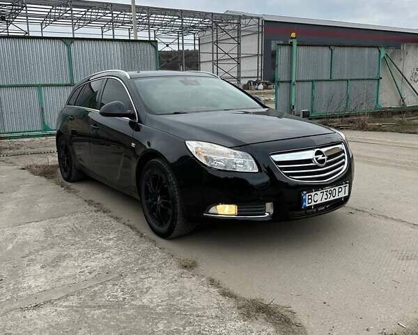 Чорний Опель Інсігнія, об'ємом двигуна 1.96 л та пробігом 293 тис. км за 7150 $, фото 1 на Automoto.ua