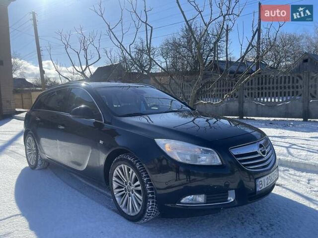 Чорний Опель Інсігнія, об'ємом двигуна 2 л та пробігом 277 тис. км за 9300 $, фото 1 на Automoto.ua