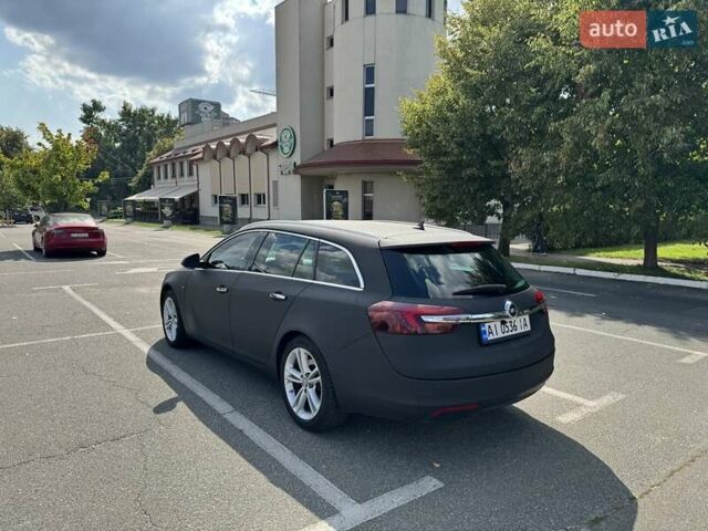 Чорний Опель Інсігнія, об'ємом двигуна 1.96 л та пробігом 237 тис. км за 12000 $, фото 1 на Automoto.ua