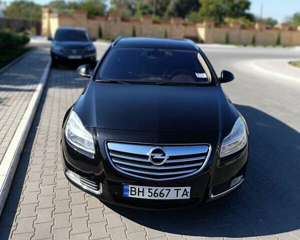 Чорний Опель Інсігнія, об'ємом двигуна 1.96 л та пробігом 295 тис. км за 7800 $, фото 1 на Automoto.ua