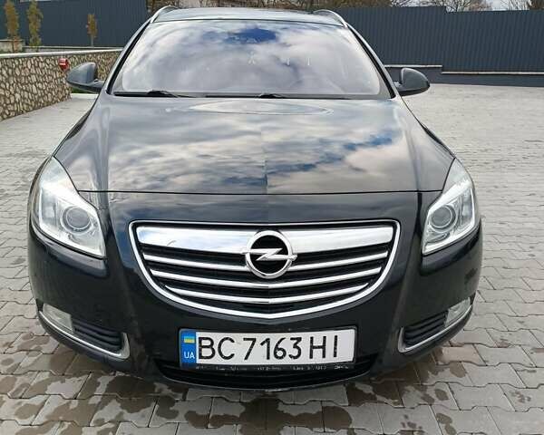 Чорний Опель Інсігнія, об'ємом двигуна 1.96 л та пробігом 300 тис. км за 7700 $, фото 1 на Automoto.ua