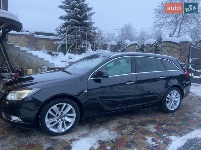 Чорний Опель Інсігнія, об'ємом двигуна 2 л та пробігом 182 тис. км за 9700 $, фото 1 на Automoto.ua