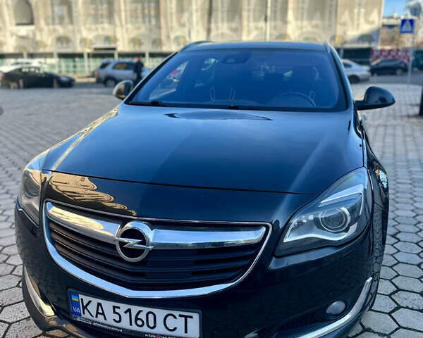 Черный Опель Инсигния, объемом двигателя 2 л и пробегом 250 тыс. км за 9800 $, фото 1 на Automoto.ua