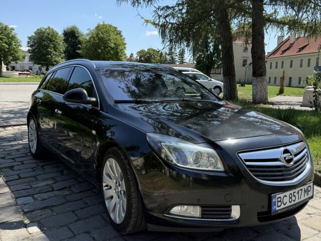 Чорний Опель Інсігнія, об'ємом двигуна 2 л та пробігом 282 тис. км за 8497 $, фото 1 на Automoto.ua