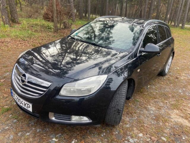 Чорний Опель Інсігнія, об'ємом двигуна 2 л та пробігом 270 тис. км за 8500 $, фото 1 на Automoto.ua