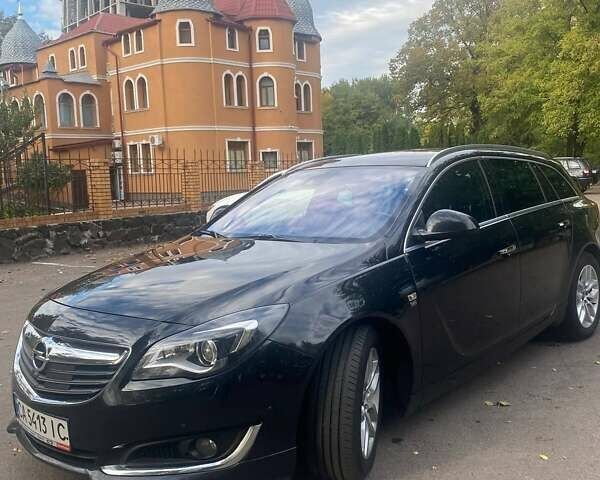 Черный Опель Инсигния, объемом двигателя 2 л и пробегом 169 тыс. км за 14199 $, фото 1 на Automoto.ua