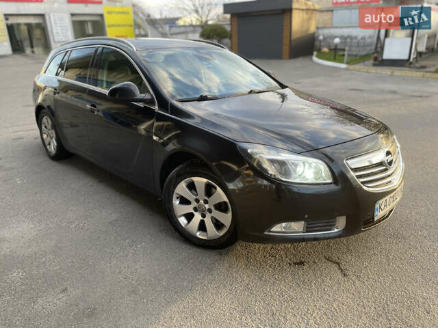 Чорний Опель Інсігнія, об'ємом двигуна 2 л та пробігом 300 тис. км за 7700 $, фото 1 на Automoto.ua