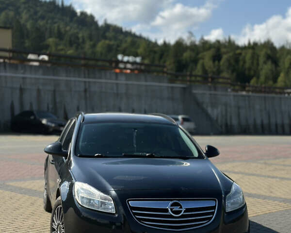 Черный Опель Инсигния, объемом двигателя 2 л и пробегом 299 тыс. км за 7799 $, фото 1 на Automoto.ua