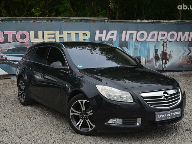 Черный Опель Инсигния, объемом двигателя 2 л и пробегом 213 тыс. км за 8999 $, фото 1 на Automoto.ua
