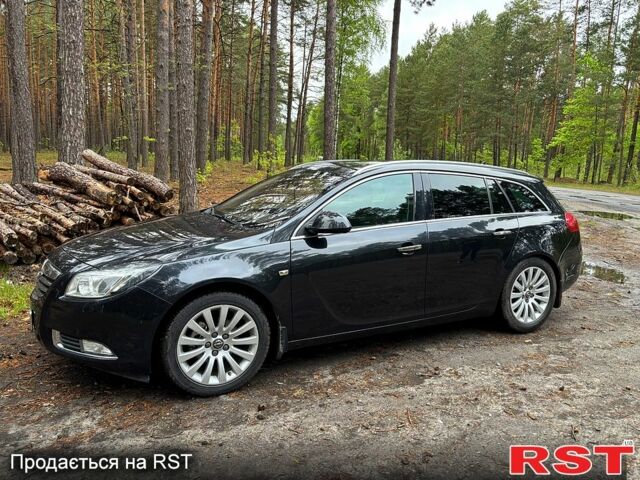 Черный Опель Инсигния, объемом двигателя 2 л и пробегом 215 тыс. км за 8550 $, фото 1 на Automoto.ua