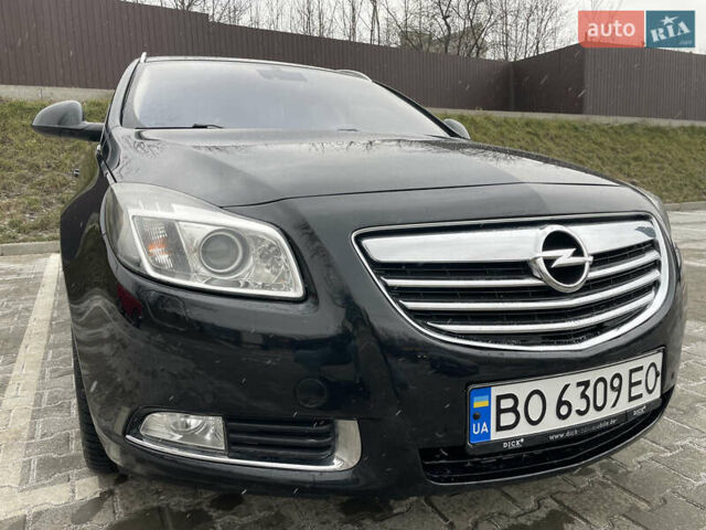 Черный Опель Инсигния, объемом двигателя 2 л и пробегом 180 тыс. км за 9400 $, фото 1 на Automoto.ua