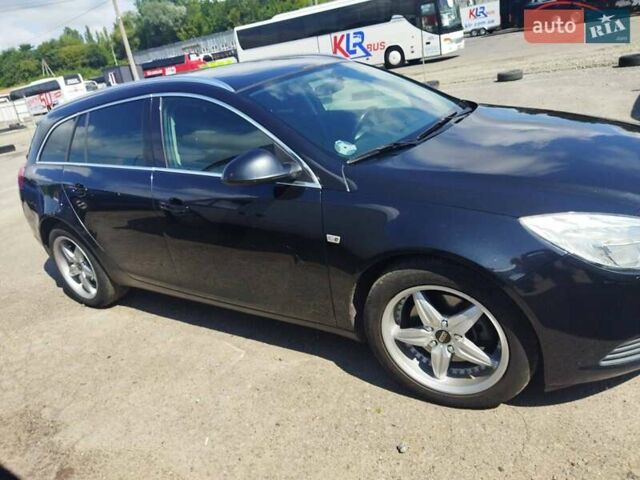 Черный Опель Инсигния, объемом двигателя 2 л и пробегом 208 тыс. км за 9900 $, фото 1 на Automoto.ua