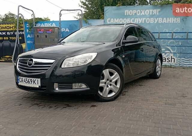 Чорний Опель Інсігнія, об'ємом двигуна 1.96 л та пробігом 234 тис. км за 8800 $, фото 1 на Automoto.ua
