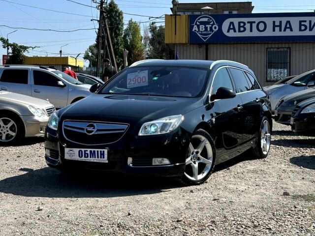 Черный Опель Инсигния, объемом двигателя 2 л и пробегом 211 тыс. км за 10400 $, фото 1 на Automoto.ua