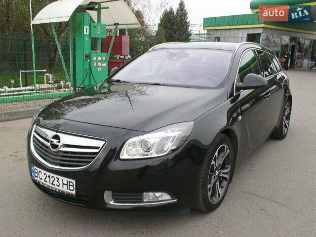 Черный Опель Инсигния, объемом двигателя 2 л и пробегом 236 тыс. км за 8900 $, фото 1 на Automoto.ua