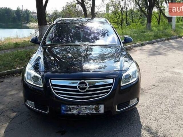 Черный Опель Инсигния, объемом двигателя 2 л и пробегом 222 тыс. км за 9300 $, фото 1 на Automoto.ua