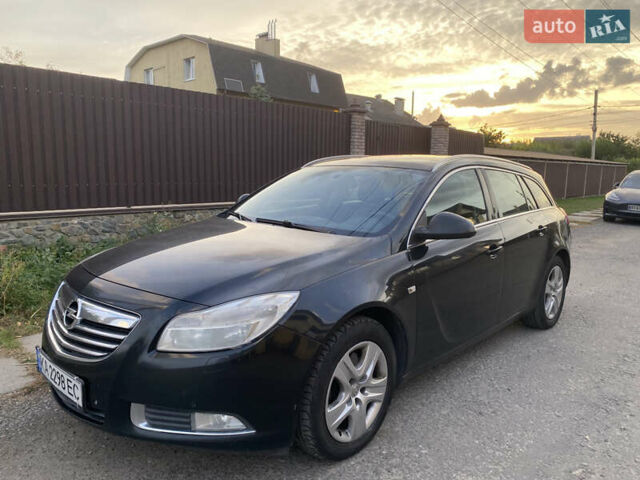 Чорний Опель Інсігнія, об'ємом двигуна 2 л та пробігом 222 тис. км за 10500 $, фото 1 на Automoto.ua