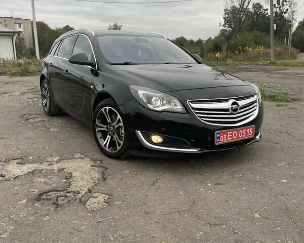 Чорний Опель Інсігнія, об'ємом двигуна 2 л та пробігом 233 тис. км за 12888 $, фото 1 на Automoto.ua