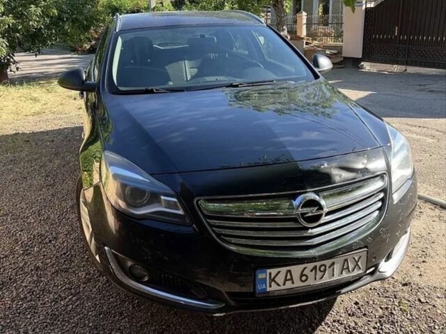 Черный Опель Инсигния, объемом двигателя 2 л и пробегом 400 тыс. км за 8225 $, фото 1 на Automoto.ua