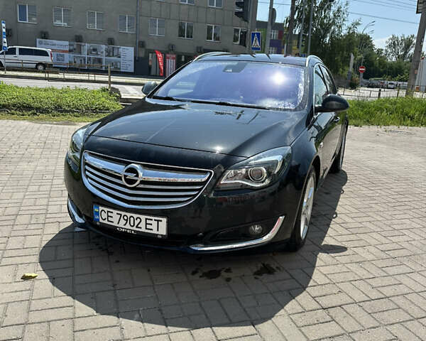 Чорний Опель Інсігнія, об'ємом двигуна 2 л та пробігом 252 тис. км за 10600 $, фото 1 на Automoto.ua