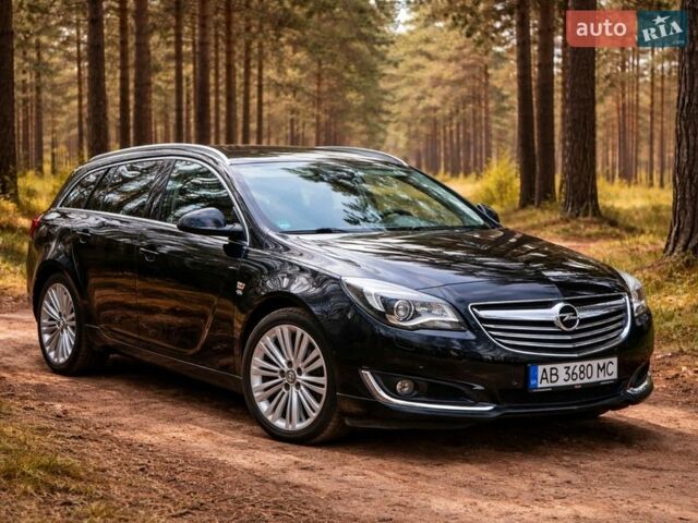 Чорний Опель Інсігнія, об'ємом двигуна 1.96 л та пробігом 174 тис. км за 10500 $, фото 1 на Automoto.ua