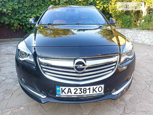 Черный Опель Инсигния, объемом двигателя 1.96 л и пробегом 183 тыс. км за 12800 $, фото 1 на Automoto.ua
