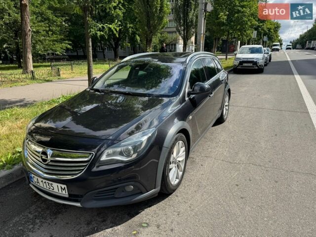 Чорний Опель Інсігнія, об'ємом двигуна 2 л та пробігом 310 тис. км за 10900 $, фото 1 на Automoto.ua