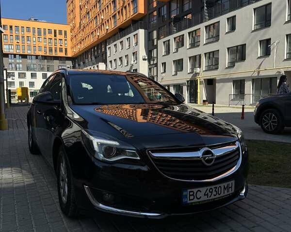 Чорний Опель Інсігнія, об'ємом двигуна 1.96 л та пробігом 236 тис. км за 11200 $, фото 1 на Automoto.ua