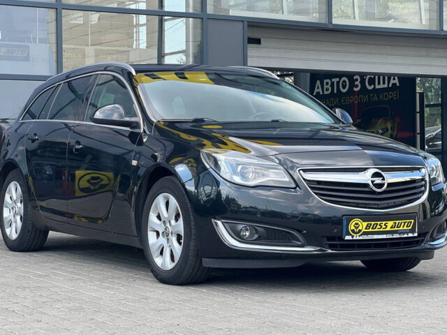 Чорний Опель Інсігнія, об'ємом двигуна 2 л та пробігом 220 тис. км за 12300 $, фото 1 на Automoto.ua