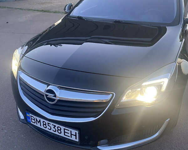 Черный Опель Инсигния, объемом двигателя 2 л и пробегом 192 тыс. км за 10300 $, фото 1 на Automoto.ua