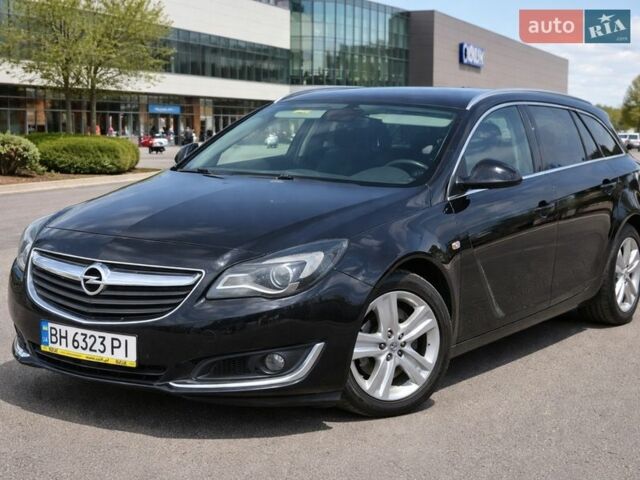 Чорний Опель Інсігнія, об'ємом двигуна 1.96 л та пробігом 285 тис. км за 10450 $, фото 1 на Automoto.ua