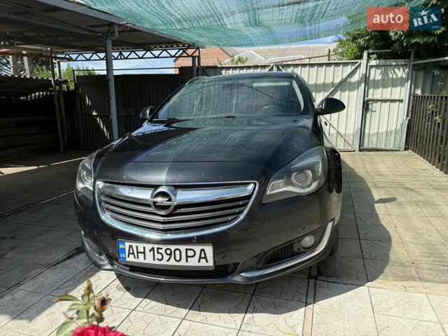 Черный Опель Инсигния, объемом двигателя 2 л и пробегом 185 тыс. км за 10900 $, фото 1 на Automoto.ua