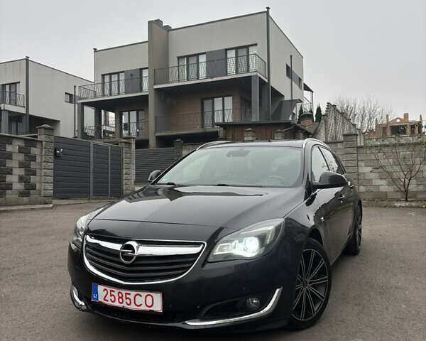 Черный Опель Инсигния, объемом двигателя 1.96 л и пробегом 312 тыс. км за 10500 $, фото 1 на Automoto.ua