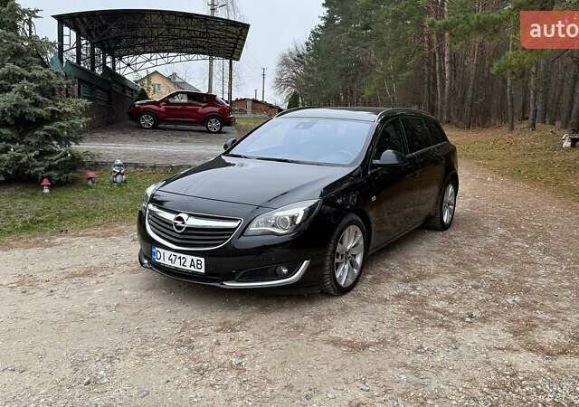 Черный Опель Инсигния, объемом двигателя 2 л и пробегом 270 тыс. км за 9500 $, фото 1 на Automoto.ua