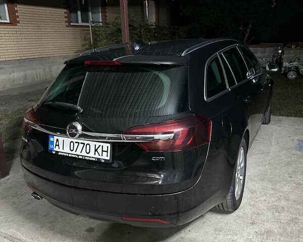 Чорний Опель Інсігнія, об'ємом двигуна 1.96 л та пробігом 280 тис. км за 12000 $, фото 1 на Automoto.ua