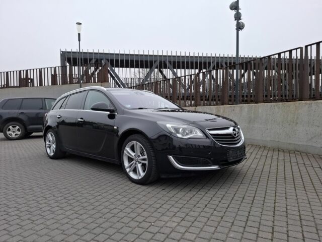 Чорний Опель Інсігнія, об'ємом двигуна 2 л та пробігом 234 тис. км за 12940 $, фото 1 на Automoto.ua