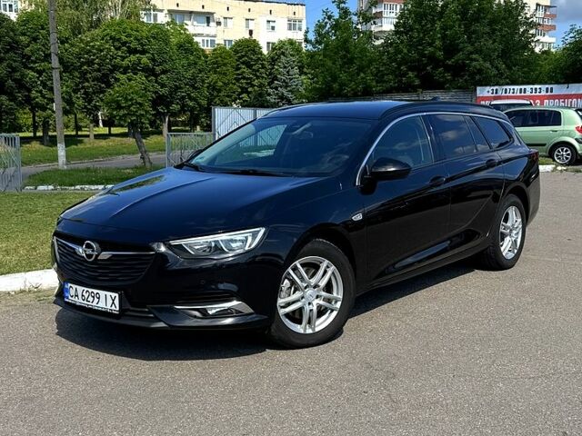 Чорний Опель Інсігнія, об'ємом двигуна 1.6 л та пробігом 211 тис. км за 11400 $, фото 1 на Automoto.ua