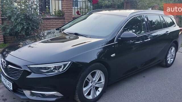 Черный Опель Инсигния, объемом двигателя 1.96 л и пробегом 199 тыс. км за 14300 $, фото 1 на Automoto.ua