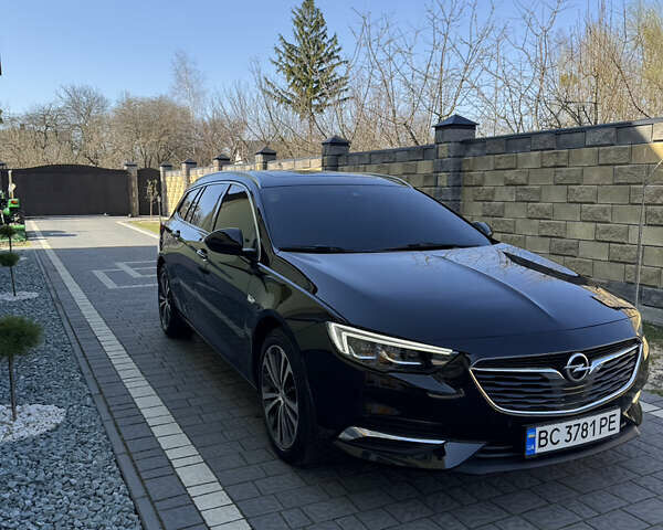 Чорний Опель Інсігнія, об'ємом двигуна 1.96 л та пробігом 240 тис. км за 13999 $, фото 1 на Automoto.ua