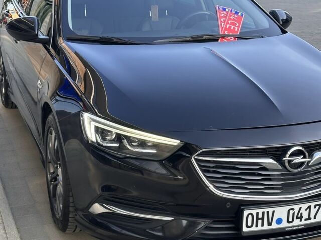 Черный Опель Инсигния, объемом двигателя 2 л и пробегом 196 тыс. км за 17000 $, фото 1 на Automoto.ua