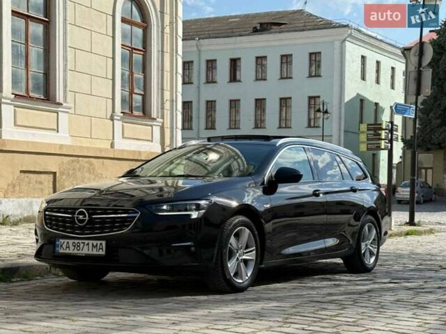 Черный Опель Инсигния, объемом двигателя 2 л и пробегом 59 тыс. км за 24500 $, фото 1 на Automoto.ua