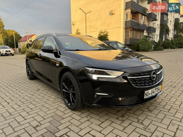 Чорний Опель Інсігнія, об'ємом двигуна 1.96 л та пробігом 213 тис. км за 18422 $, фото 1 на Automoto.ua