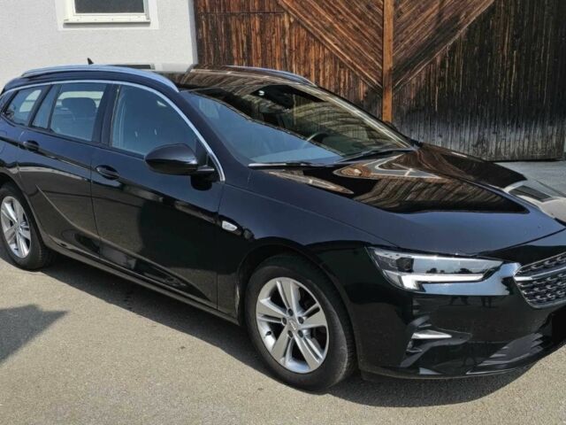 Черный Опель Инсигния, объемом двигателя 2 л и пробегом 25 тыс. км за 18400 $, фото 1 на Automoto.ua