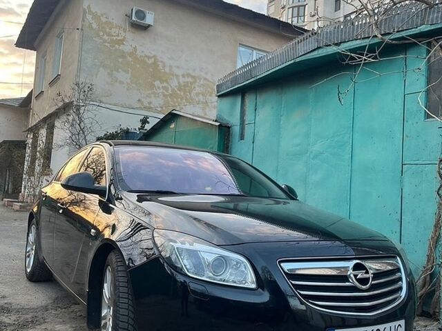 Чорний Опель Інсігнія, об'ємом двигуна 1.6 л та пробігом 227 тис. км за 7200 $, фото 1 на Automoto.ua